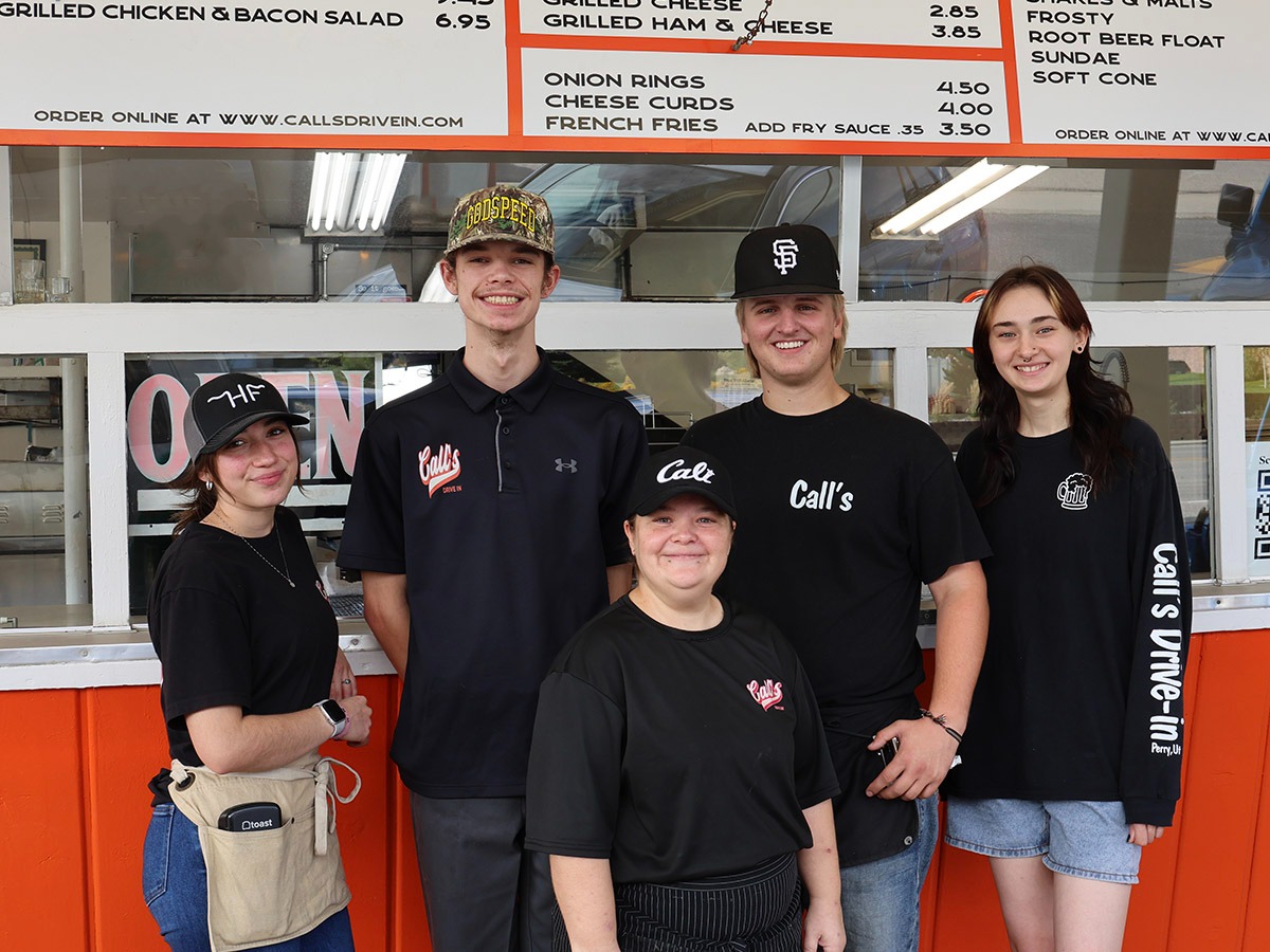 The Call's Drive-In team standing together outside the restaurant